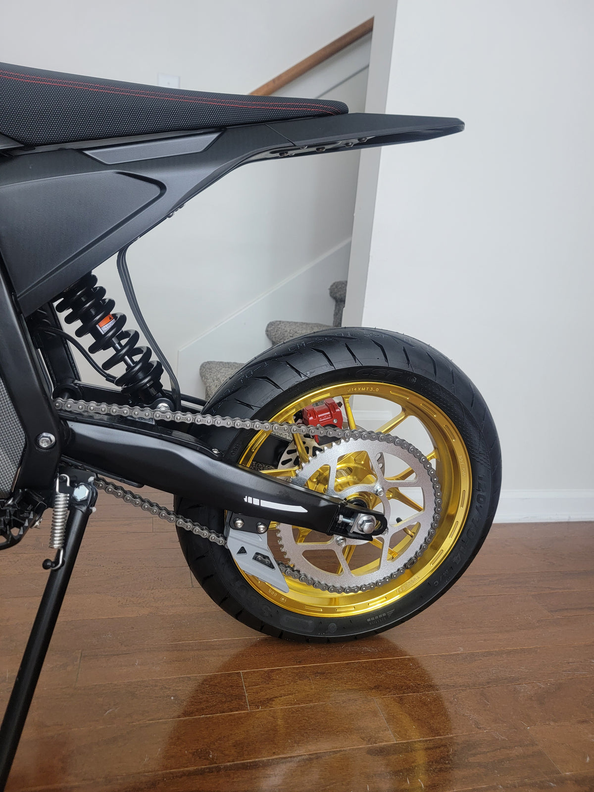 14 inch CNC gold supermoto wheels and tires.